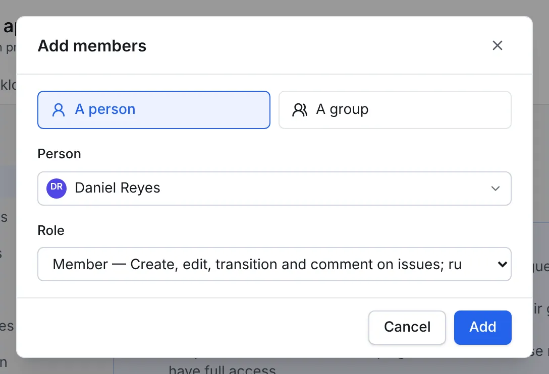 The Add members dialog with A person selected, Daniel Reyes chosen and the role Member